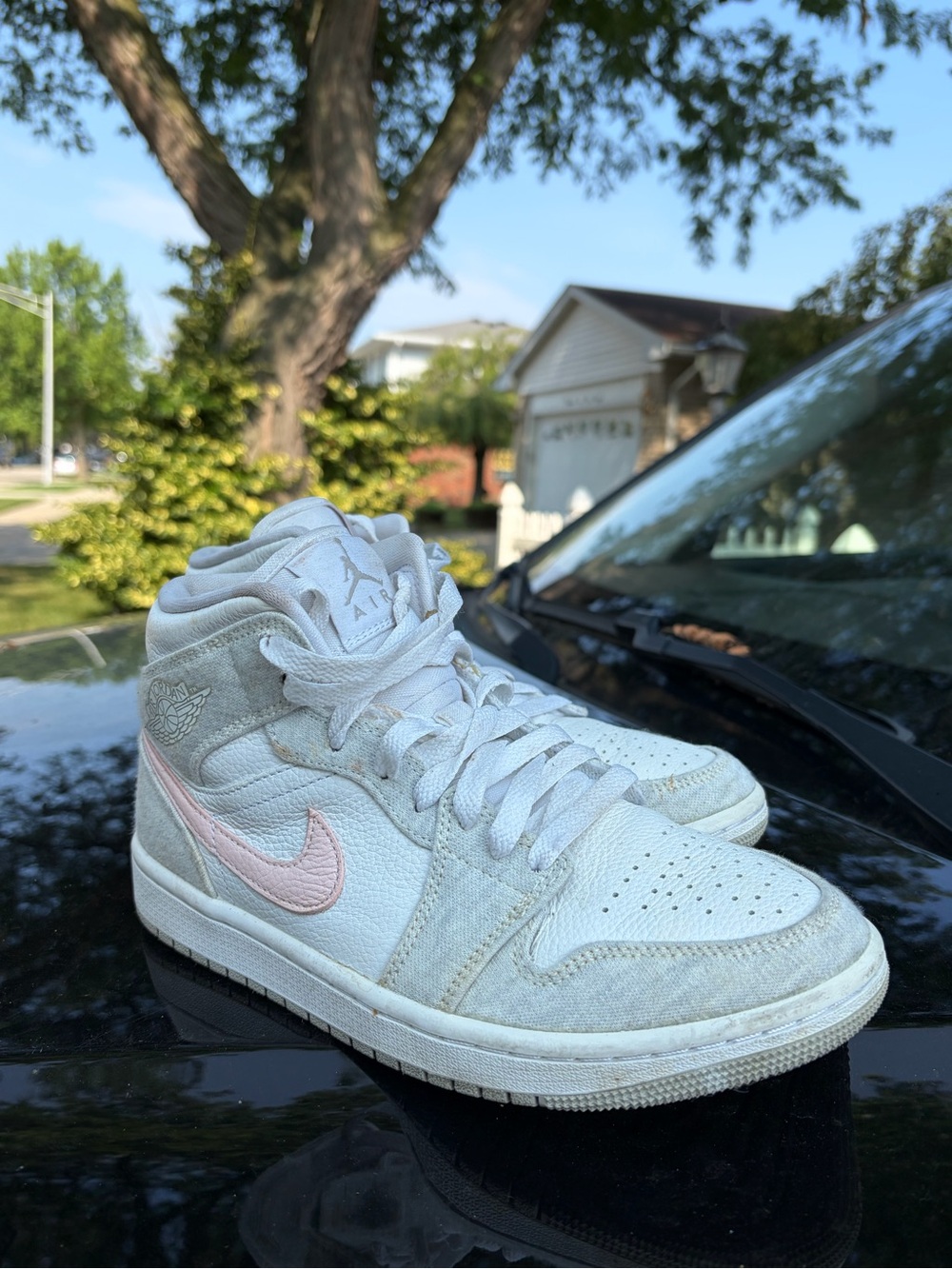 Jordan Women's Mid-Top Sneakers in White with Light Pink Swoosh